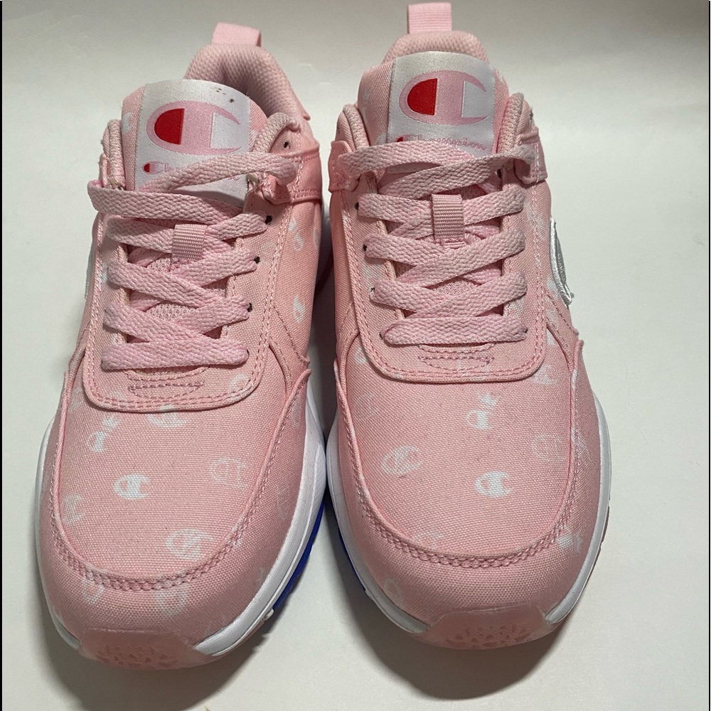 Never worn pink champion sneakers. Kids five